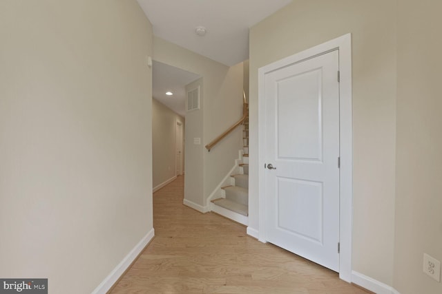 20765 Duxbury Ter, Ashburn, VA 20147 - corridor featuring light wood finished floors, stairs, and recessed lighting