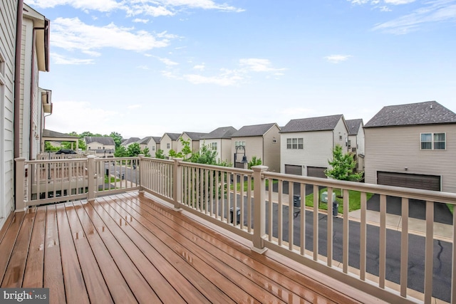 20765 Duxbury Ter, Ashburn, VA 20147 - wooden deck featuring a residential view and a garage