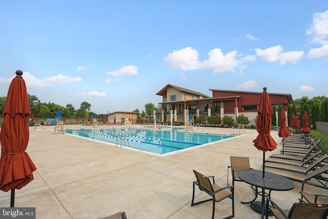 20765 Duxbury Ter, Ashburn, VA 20147 - community pool with a patio