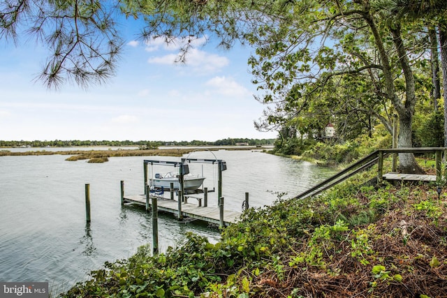 view of dock featuring a water view