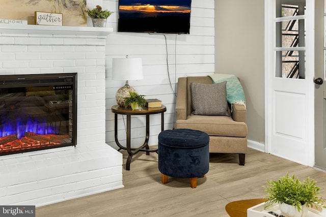 sitting room with light wood-type flooring