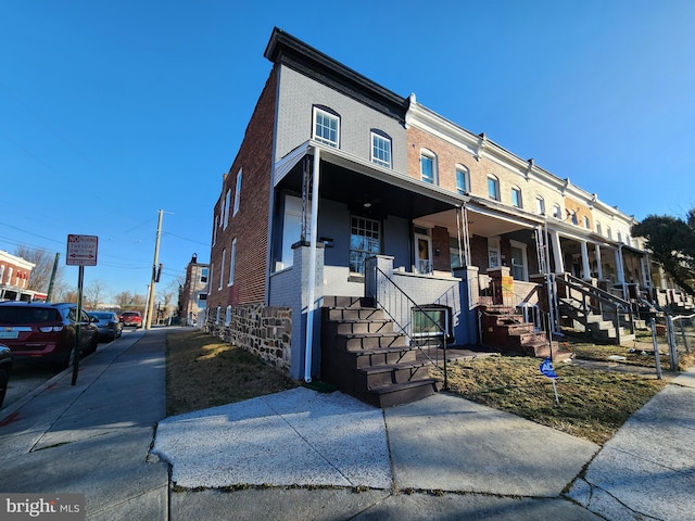 multi unit property featuring covered porch