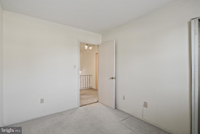 unfurnished room featuring carpet floors