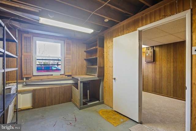 interior space featuring wood walls