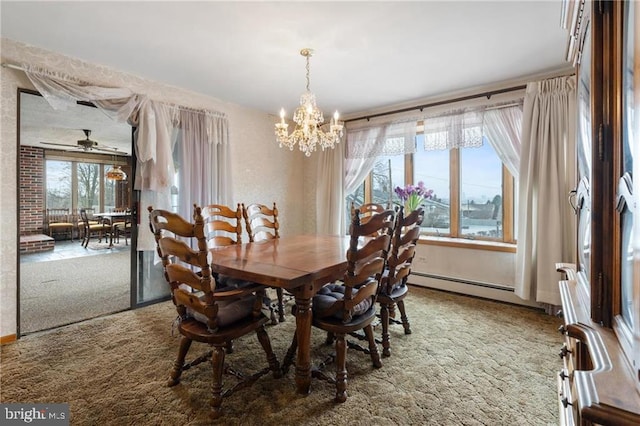 dining area with ceiling fan with notable chandelier, a baseboard radiator, and carpet