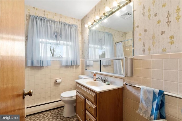 bathroom featuring a baseboard radiator, tile walls, vanity, toilet, and a shower with curtain