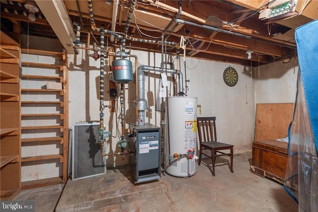 utility room featuring water heater