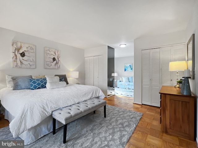 bedroom featuring two closets