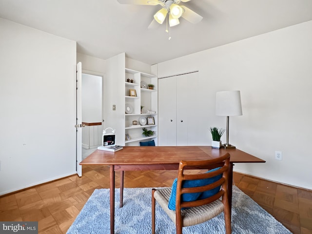 home office with a ceiling fan