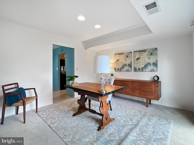 carpeted office featuring visible vents and recessed lighting