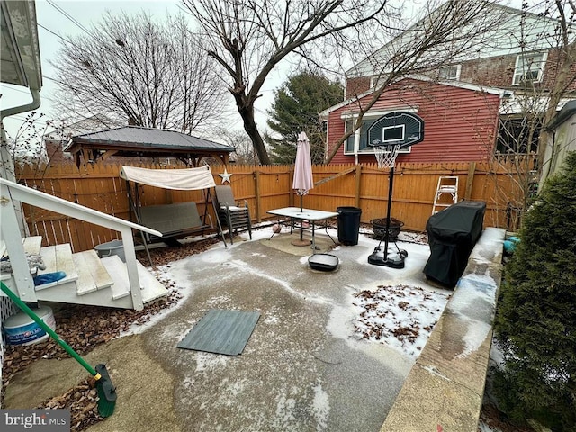 view of patio / terrace with a gazebo, grilling area, and an outdoor fire pit