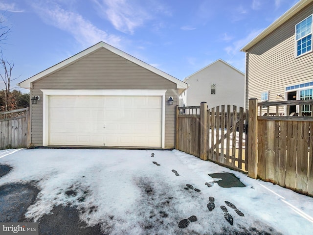 view of snow covered garage