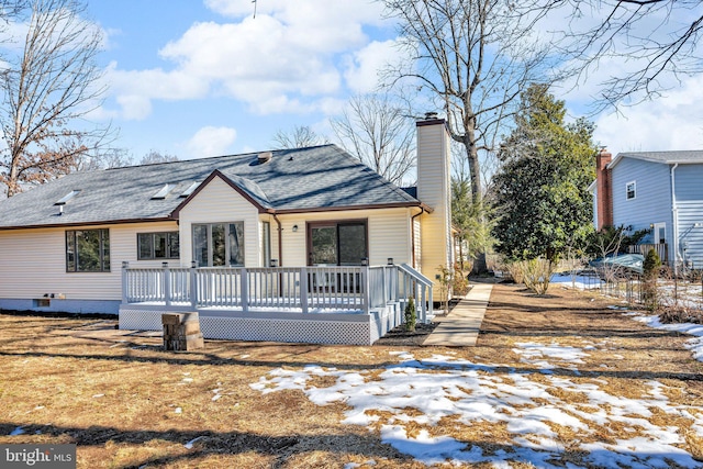 view of front of home with a wooden deck