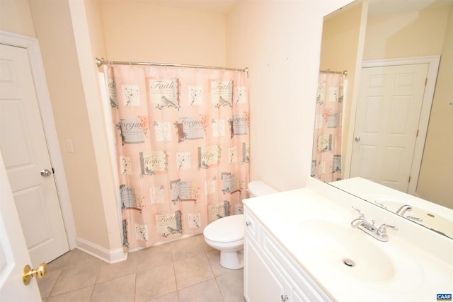 bathroom featuring tile patterned floors, toilet, a shower with shower curtain, and vanity