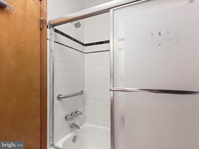 bathroom featuring enclosed tub / shower combo