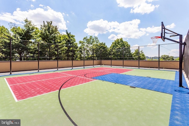 view of sport court with community basketball court and fence