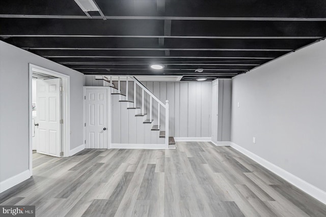 basement featuring hardwood / wood-style flooring