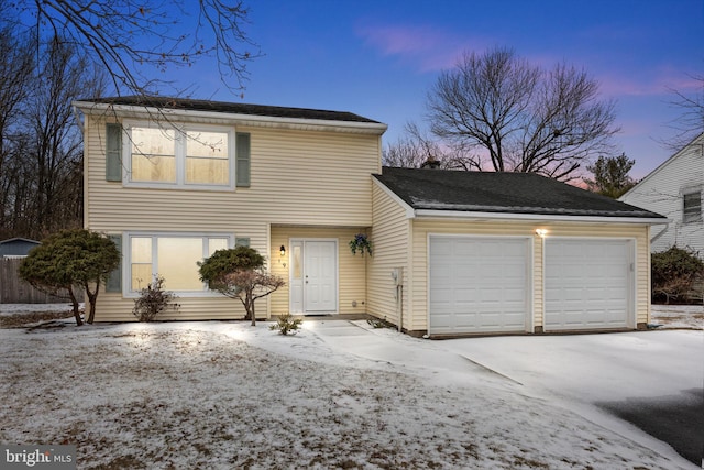 view of front property with a garage