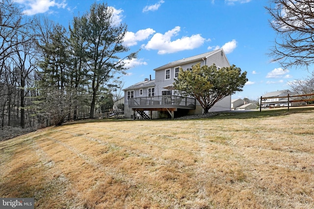 exterior space featuring a deck and a yard