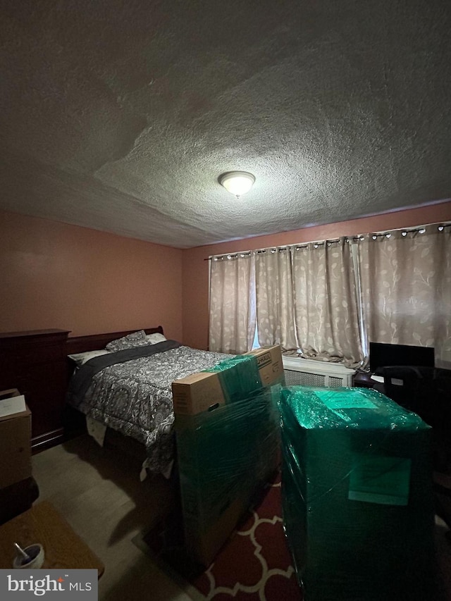 bedroom with a textured ceiling