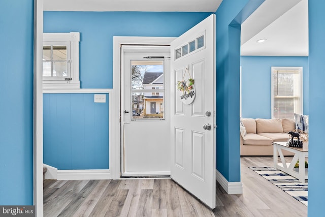 foyer with light hardwood / wood-style floors