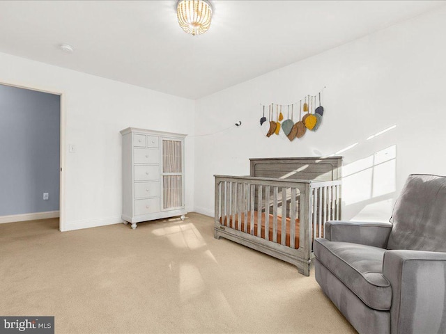 carpeted bedroom with baseboards