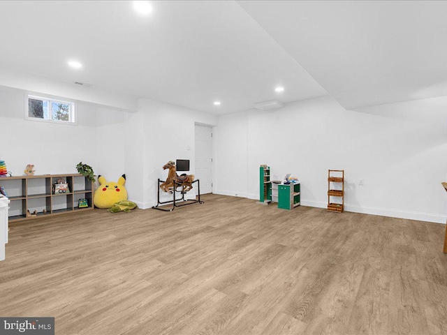 interior space with visible vents, recessed lighting, baseboards, and wood finished floors