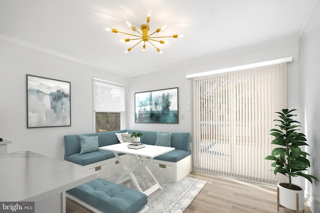 living area featuring a chandelier, breakfast area, light wood-style flooring, and crown molding