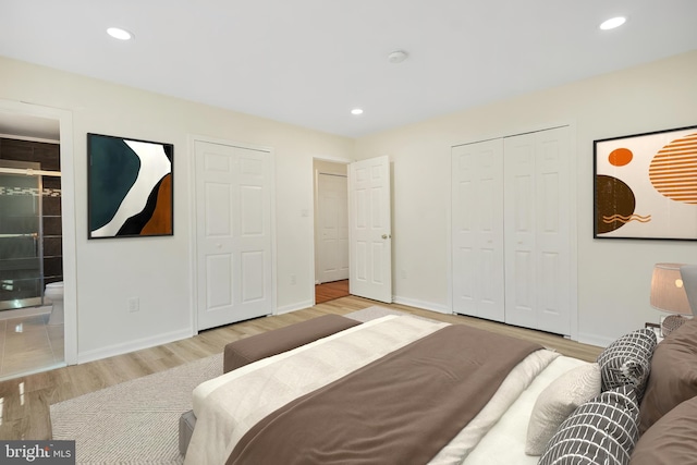 bedroom with baseboards, light wood finished floors, and recessed lighting