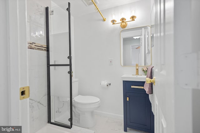 bathroom with a stall shower, baseboards, toilet, marble finish floor, and vanity