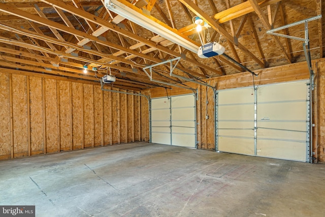 garage featuring a garage door opener