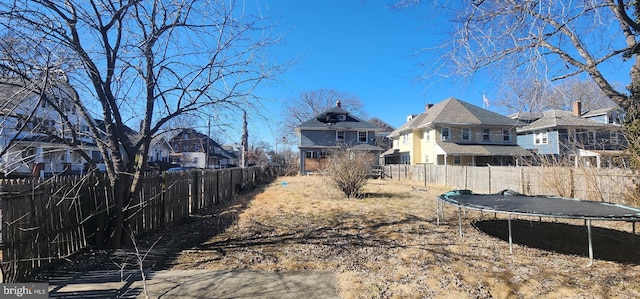 view of yard with a trampoline