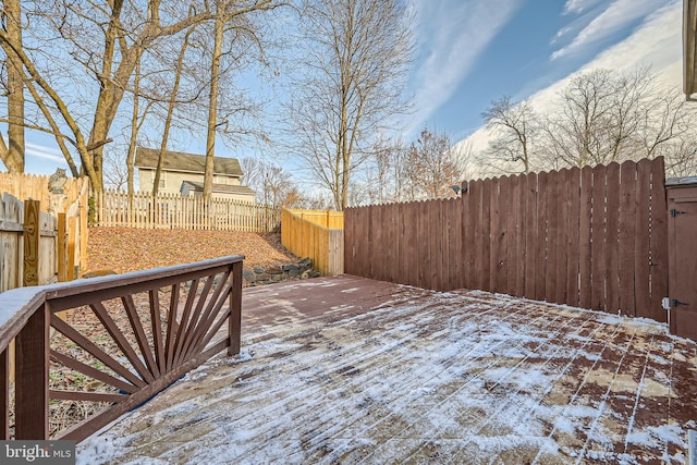 view of snow covered deck