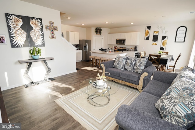 living room featuring dark wood-type flooring