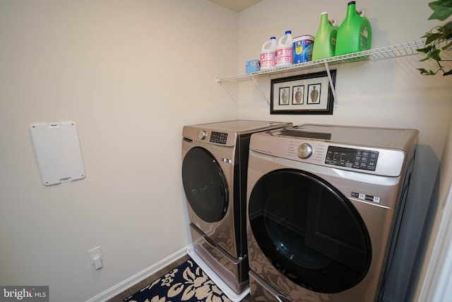 washroom with washer and clothes dryer