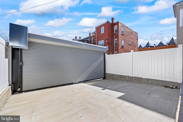 view of patio / terrace featuring fence