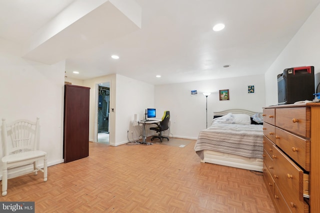 bedroom featuring baseboards and recessed lighting