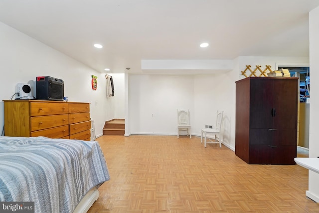 bedroom featuring baseboards and recessed lighting