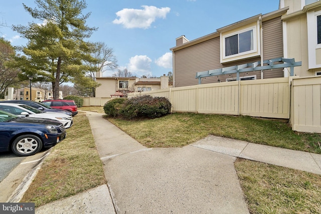 view of yard with fence