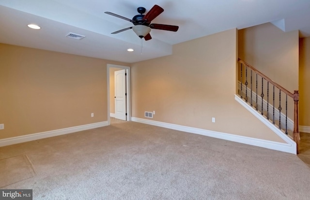 unfurnished room with carpet floors and ceiling fan