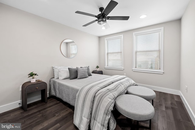 bedroom featuring a ceiling fan, baseboards, dark wood-type flooring, and recessed lighting