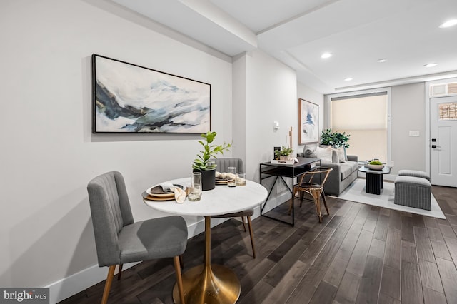 dining area featuring dark wood-style flooring, recessed lighting, and baseboards