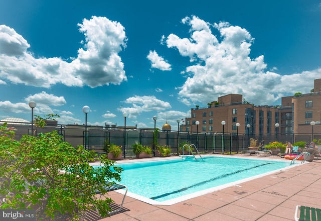 community pool with fence