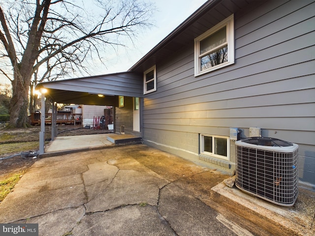 exterior space featuring central AC and a patio area