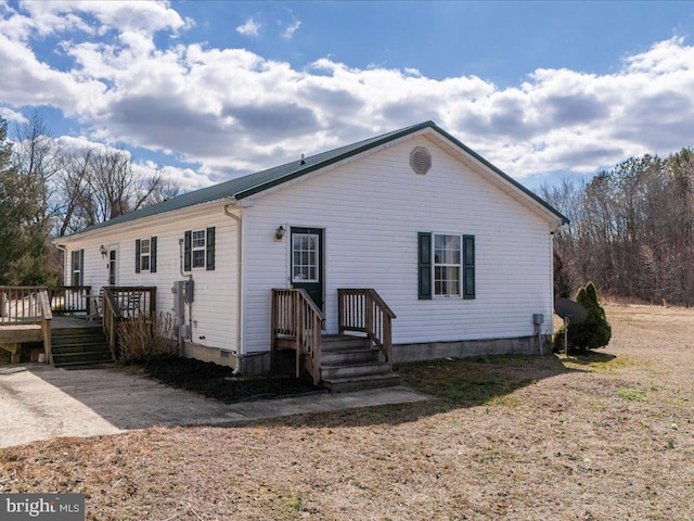 view of front facade featuring a deck