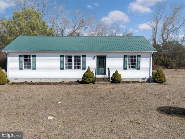 ranch-style house featuring metal roof and crawl space