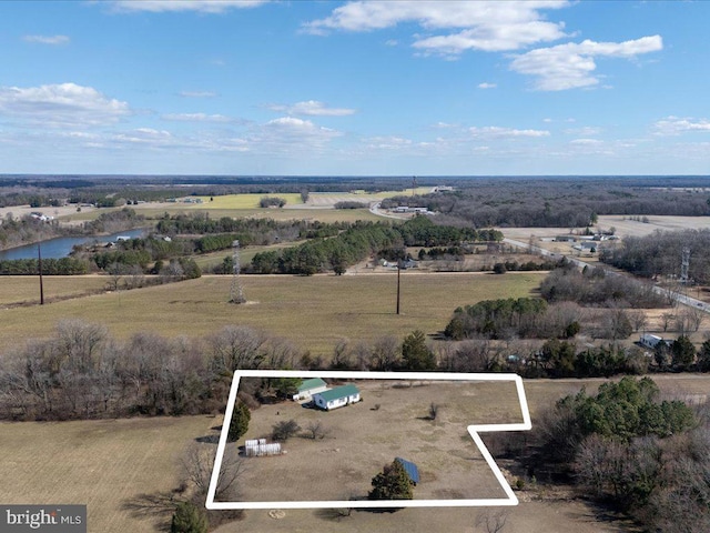 birds eye view of property featuring a rural view