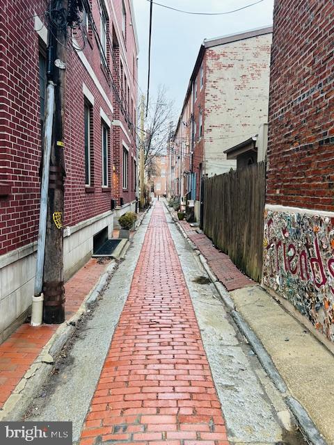 view of road featuring curbs