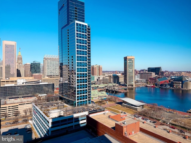 property's view of city with a water view