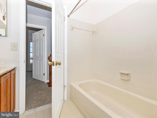 full bath featuring shower / bathing tub combination, tile patterned flooring, and vanity